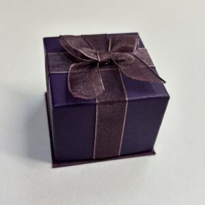 lovely purple cardboard Ring boxes with lift off lid with a matching flocked ring base.
