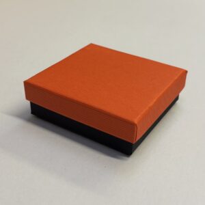 Quality Cardboard Large Universal box, Mandarin Orange lid with black base with black inserts.