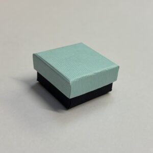 Quality Cardboard Small Universal box, Turquoise lid with black base with black inserts.